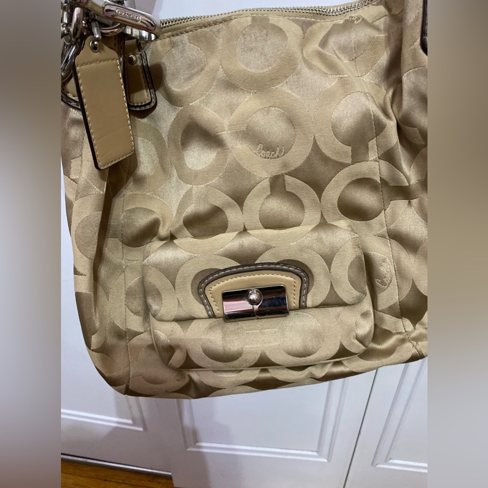 Coach signature shoulder bag with long cross body strap also